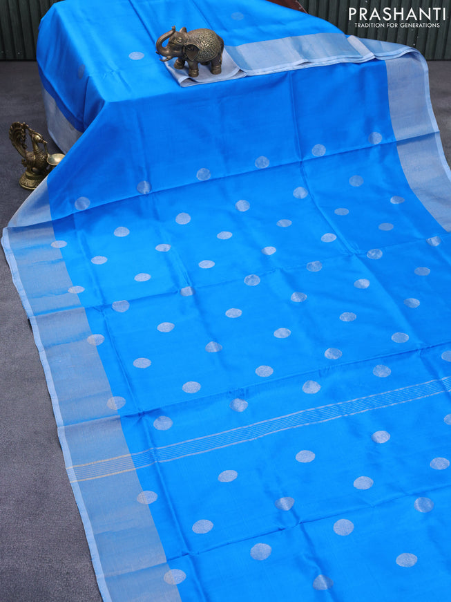 Pure uppada silk saree blue with silver zari woven coin buttas and silver zari woven border