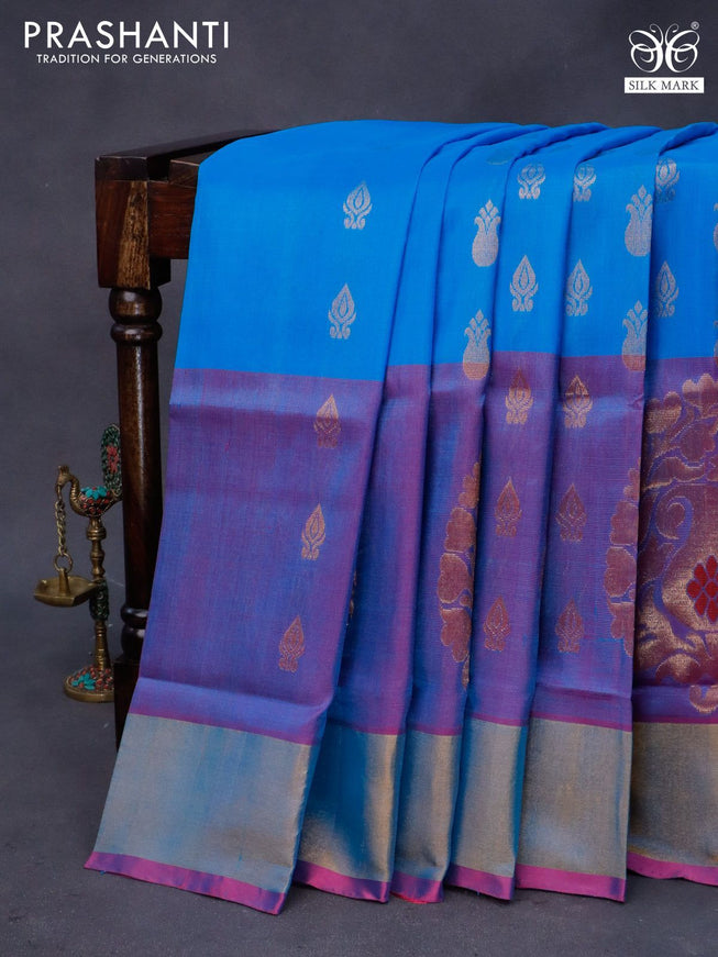 Pure uppada silk saree cs blue and magenta pink with allover zari woven buttas and long paisley design zari woven border