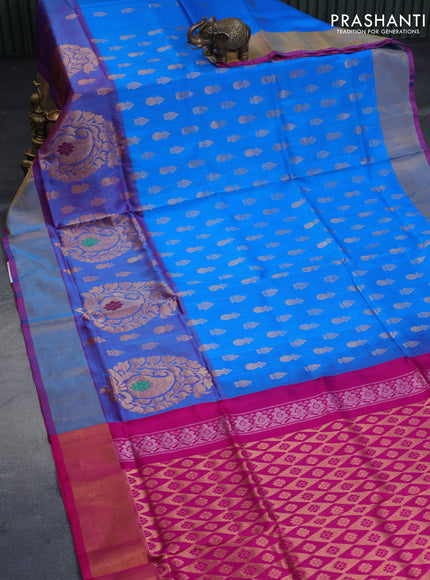 Pure uppada silk saree cs blue and magenta pink with allover zari woven buttas and long paisley design zari woven border