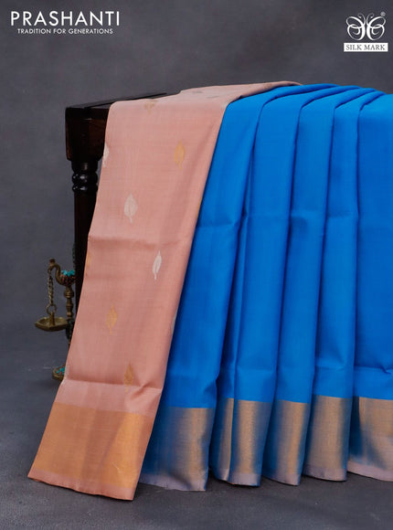 Pure uppada partly silk saree cs blue and mild peach shade with plain body and zari woven border