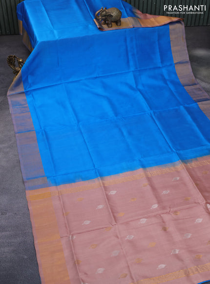 Pure uppada partly silk saree cs blue and mild peach shade with plain body and zari woven border