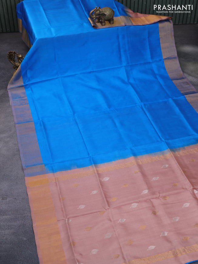 Pure uppada partly silk saree cs blue and mild peach shade with plain body and zari woven border