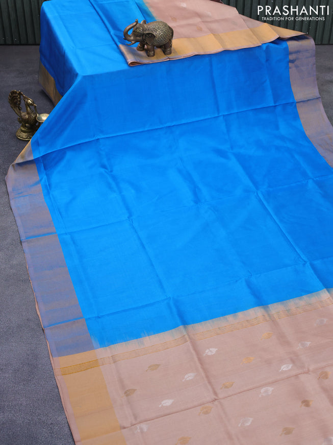 Pure uppada partly silk saree cs blue and sandal with plain body and zari woven border