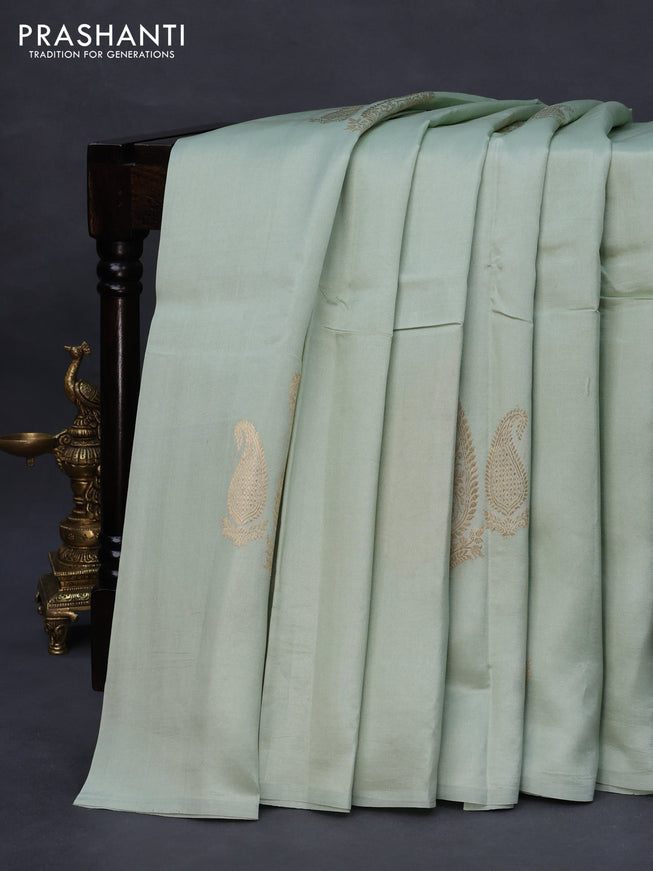 Poona silk saree pastel green with paisley zari woven buttas in borderless style