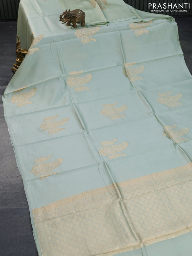 Poona silk saree pastel green with paisley zari woven buttas in borderless style