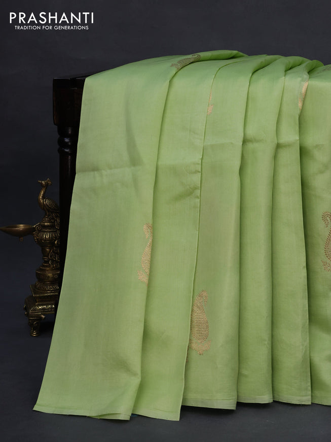 Poona silk saree pista green with paisley zari woven buttas in borderless style