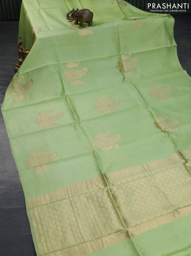 Poona silk saree pista green with paisley zari woven buttas in borderless style