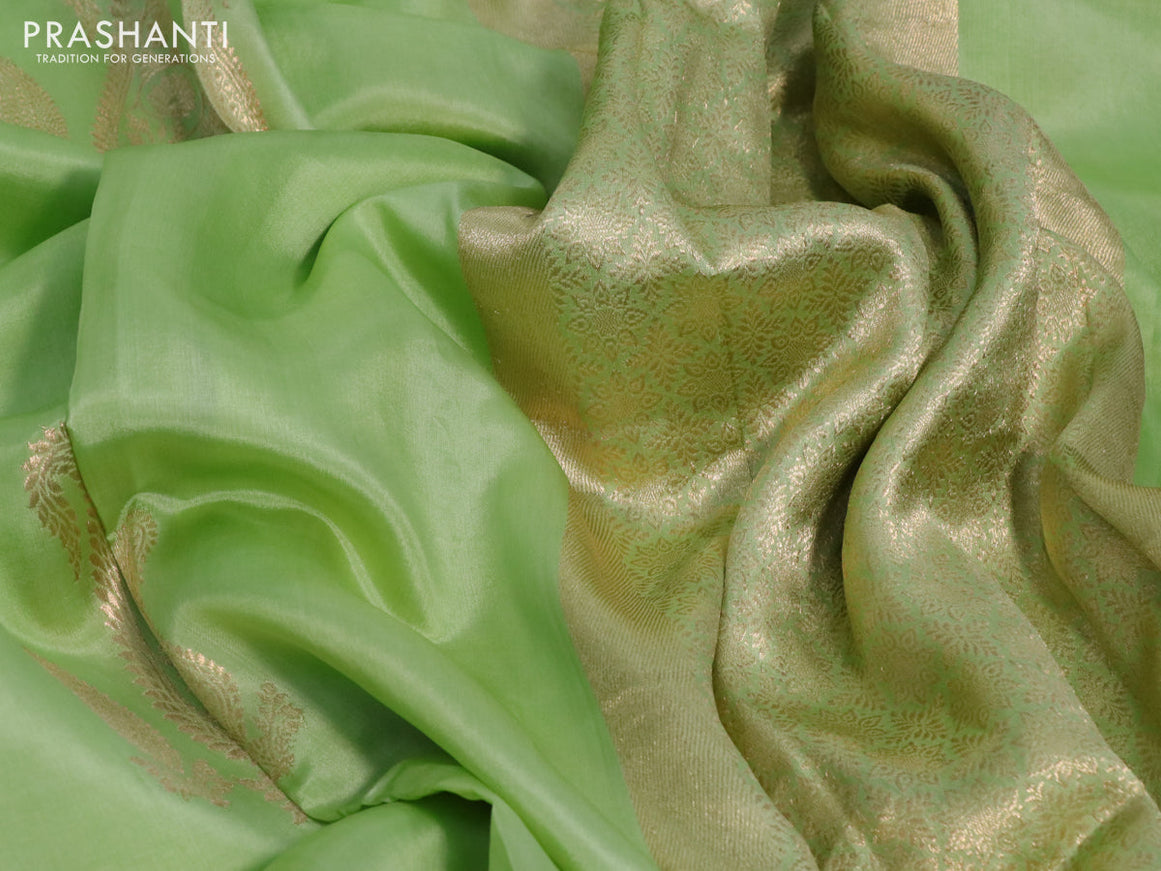 Poona silk saree pista green with paisley zari woven buttas in borderless style