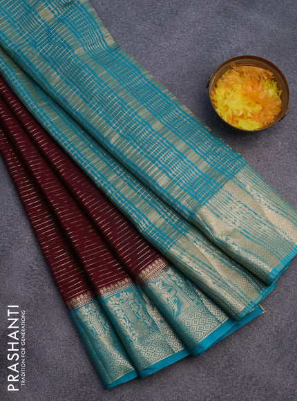 Semi crepe saree deep maroon and teal blue with allover zari weaves and zari woven border