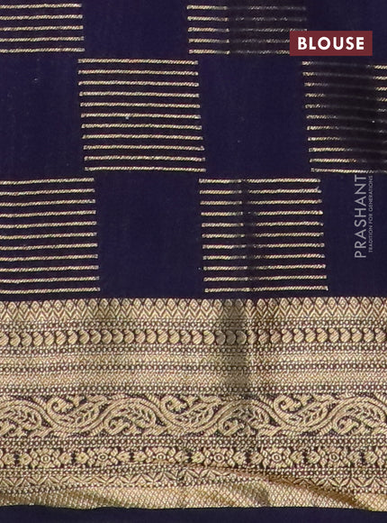 Semi crepe saree pink and dark blue with allover zari woven geometric weaves and zari woven border