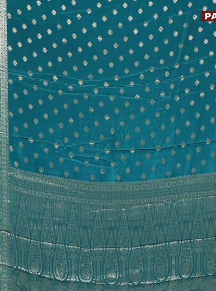 Semi crepe saree peacock green with thread woven buttas and thread woven border