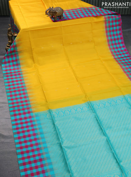 Pure soft silk saree yellow and teal blue with zari woven buttas and checked border