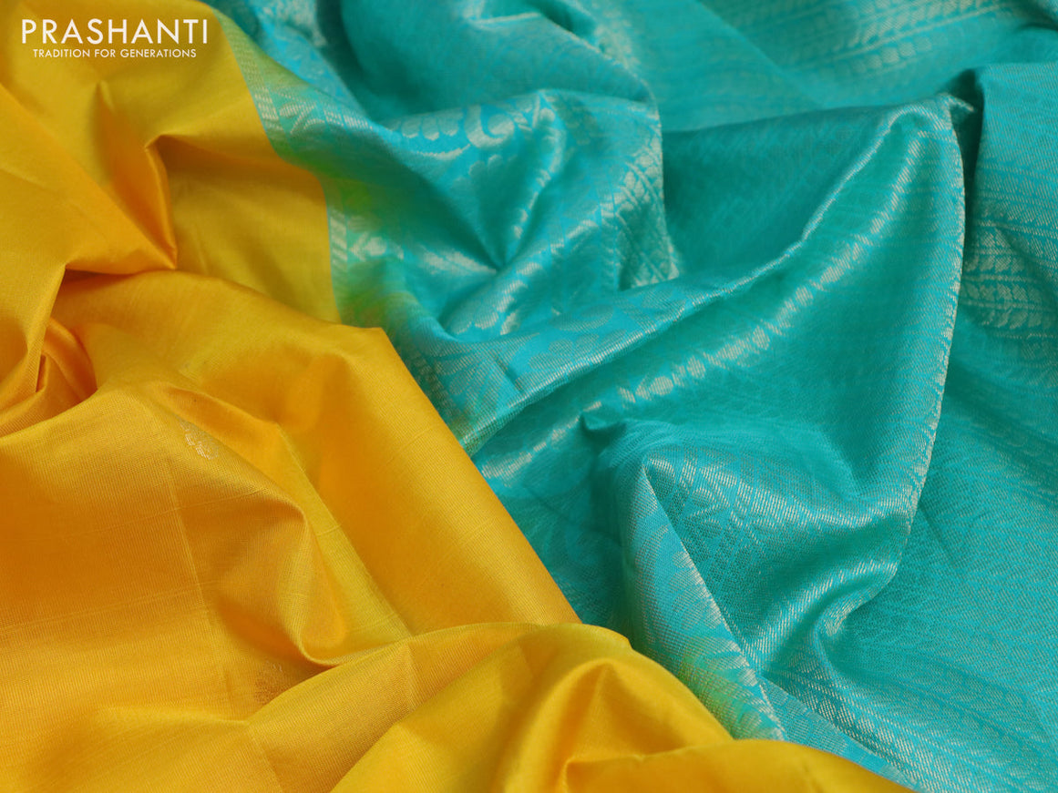 Pure soft silk saree yellow and teal blue with zari woven buttas and checked border