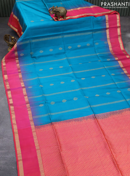 Pure soft silk saree teal blue shade and dual shade of pinkish orange with allover zari weaves & buttas and rettapet zari woven border