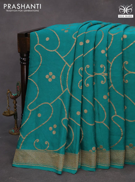 Banarasi crepe silk saree teal green with allover thread & zari weaves and woven border