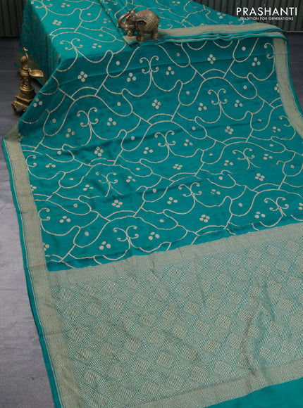 Banarasi crepe silk saree teal green with allover thread & zari weaves and woven border