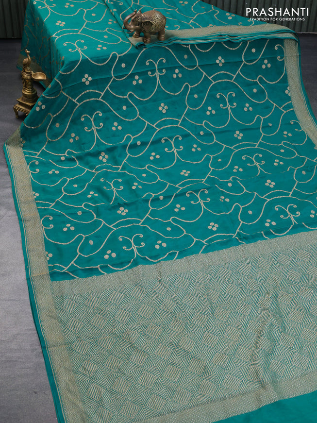 Banarasi crepe silk saree teal green with allover thread & zari weaves and woven border