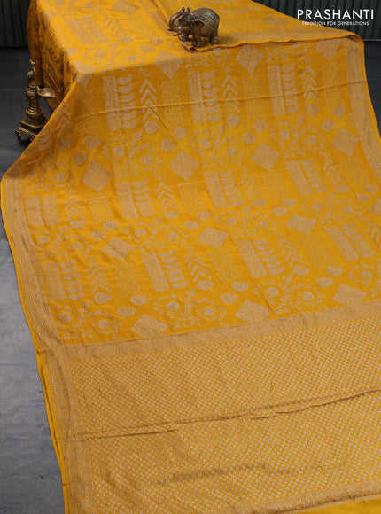 Banarasi crepe silk saree mustard yellow with allover thread & zari weaves and woven border