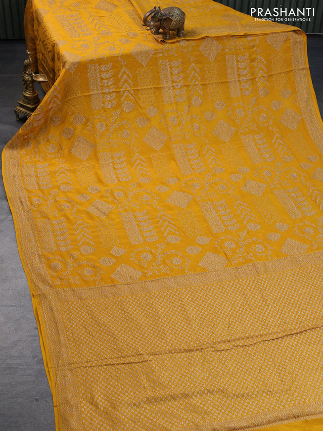 Banarasi crepe silk saree mustard yellow with allover thread & zari weaves and woven border