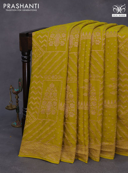 Banarasi crepe silk saree yellow with allover thread & zari weaves and woven border