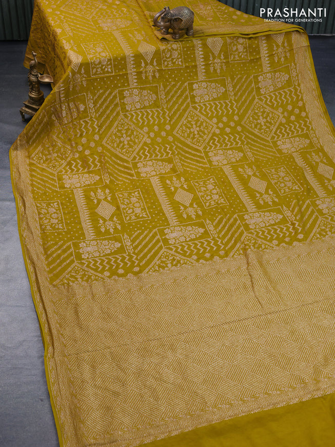 Banarasi crepe silk saree yellow with allover thread & zari weaves and woven border