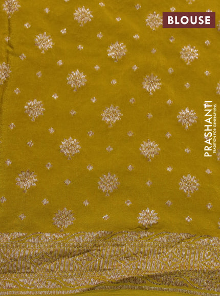 Banarasi crepe silk saree yellow with allover thread & zari weaves and woven border