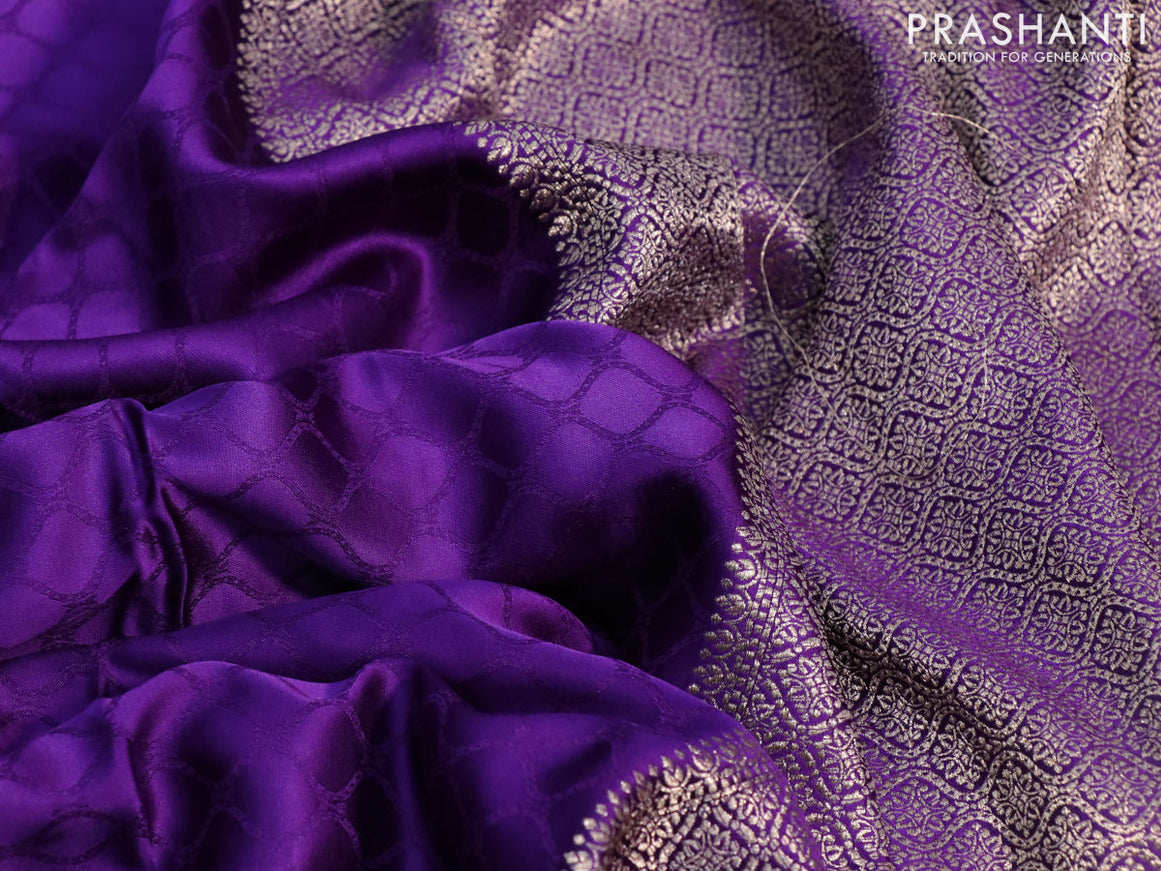 Mushru silk saree violet with allover self emboss and zari woven butta border