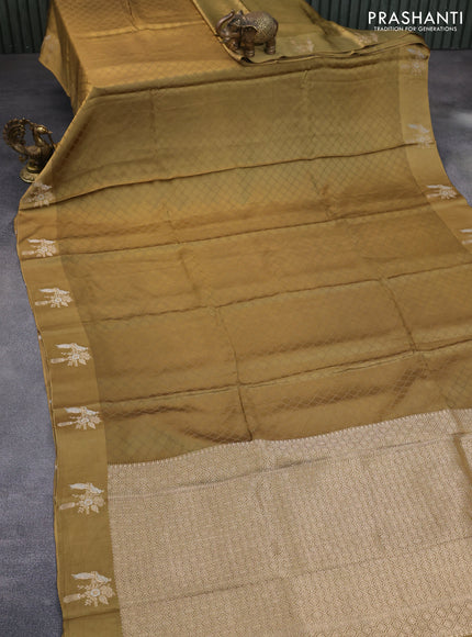 Mushru silk saree olive green with allover self emboss and zari woven butta border