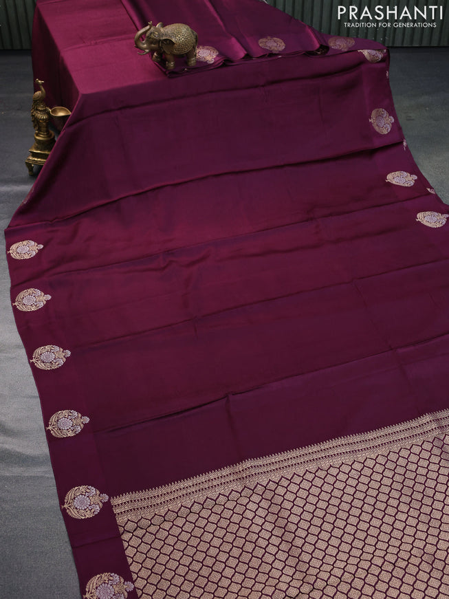 Mushru silk saree purple with allover self emboss and zari woven butta border