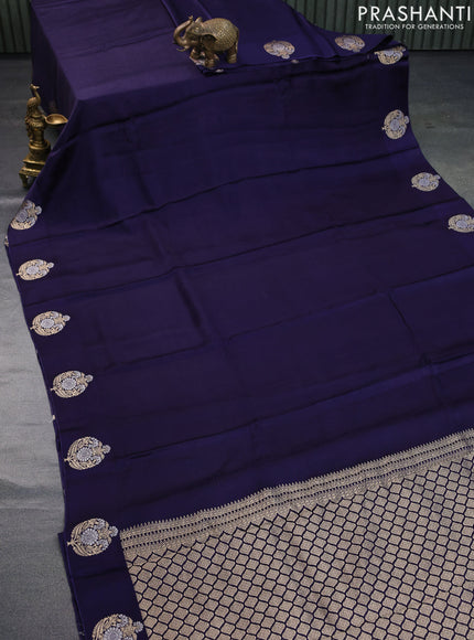 Mushru silk saree navy blue with allover self emboss and zari woven butta border