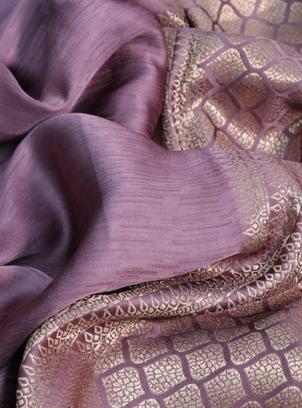 Mushru silk saree pastel purple with allover self emboss and zari woven butta border