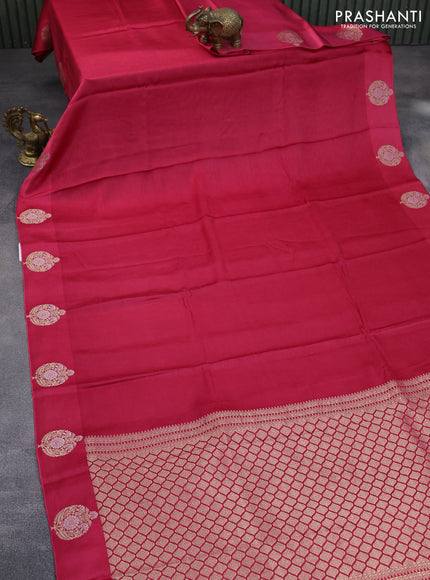 Mushru silk saree pink with allover self emboss and zari woven butta border