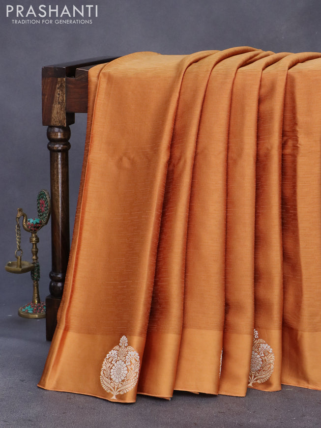 Mushru silk saree dark mustard with allover self emboss and zari woven butta border