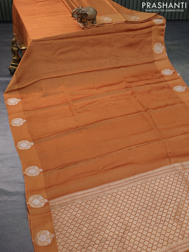 Mushru silk saree dark mustard with allover self emboss and zari woven butta border