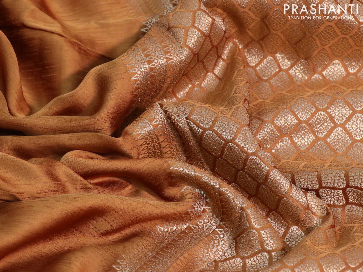 Mushru silk saree dark mustard with allover self emboss and zari woven butta border