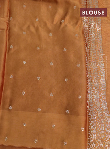 Mushru silk saree dark mustard with allover self emboss and zari woven butta border