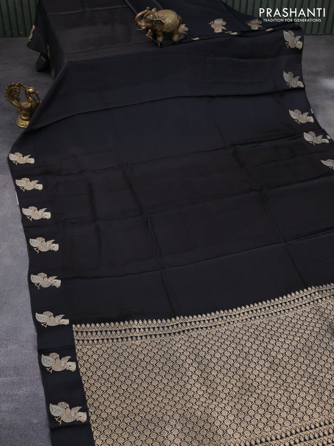 Mushru silk saree black with plain body and annam zari woven butta border