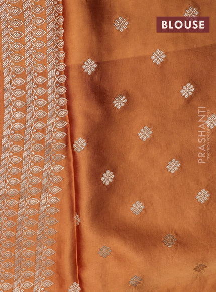 Mushru silk saree rust shade with plain body and annam zari woven butta border