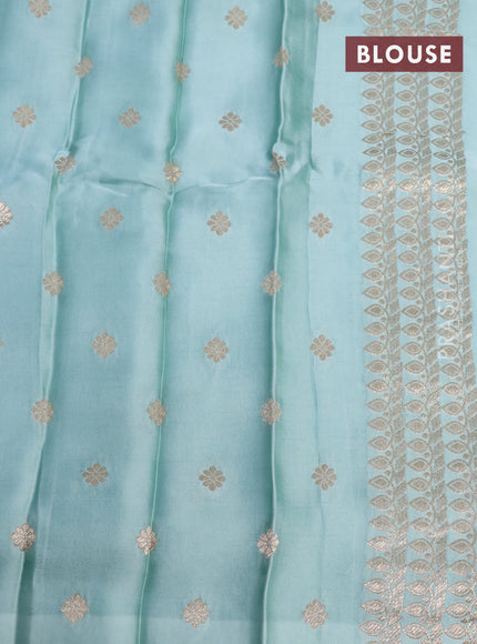 Mushru silk saree pastel blue with plain body and annam zari woven butta border