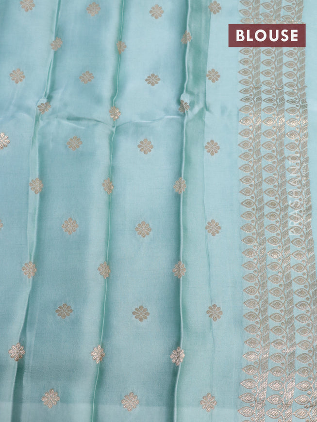 Mushru silk saree pastel blue with plain body and annam zari woven butta border