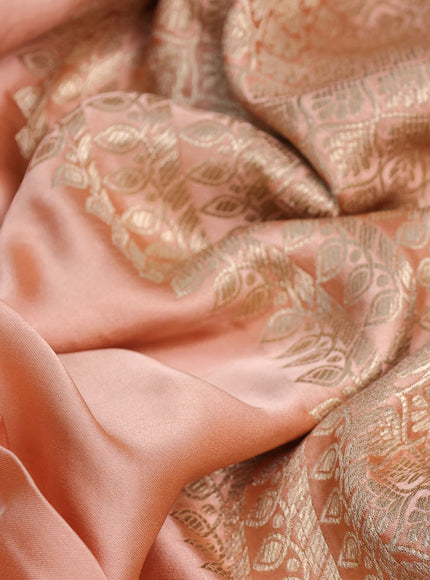 Mushru silk saree pale orange with plain body and annam zari woven butta border