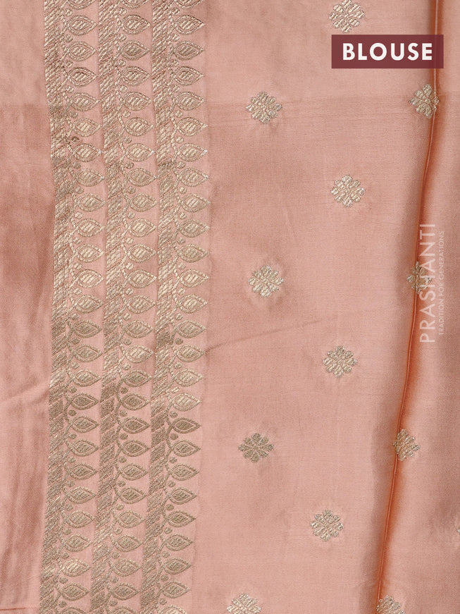 Mushru silk saree pale orange with plain body and annam zari woven butta border