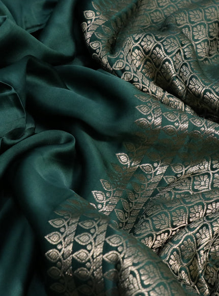 Mushru silk saree green with plain body and annam zari woven butta border