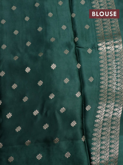 Mushru silk saree green with plain body and annam zari woven butta border