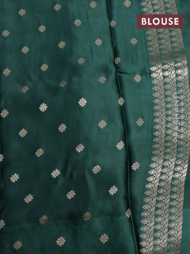 Mushru silk saree green with plain body and annam zari woven butta border