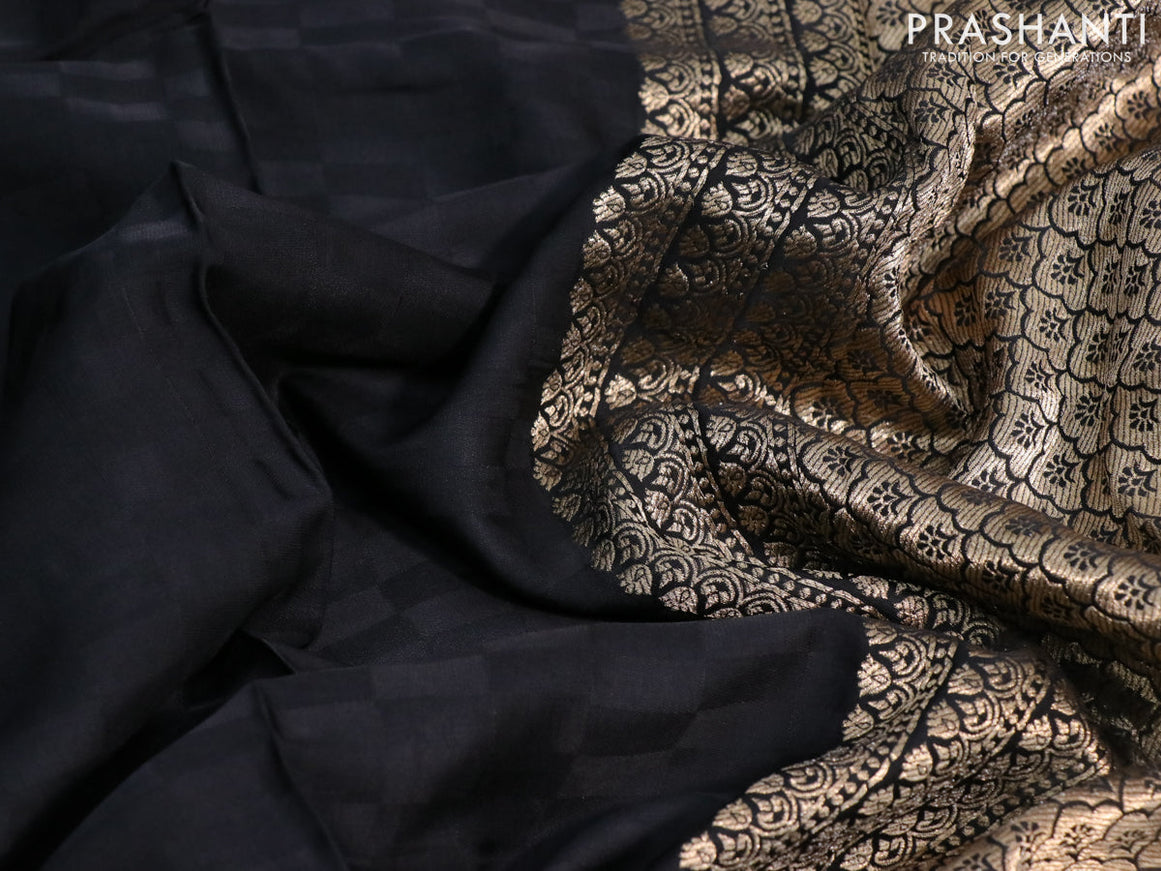 Mushru silk saree black with allover self emboss and peacock zari woven butta border