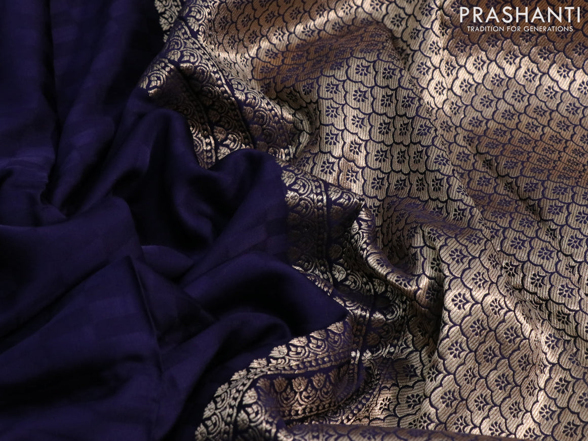 Mushru silk saree navy blue with allover self emboss and peacock zari woven butta border