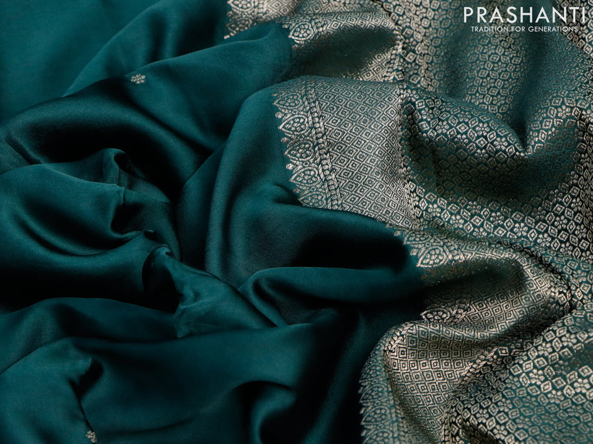 Mushru silk saree green with zari woven buttas and zari woven butta border