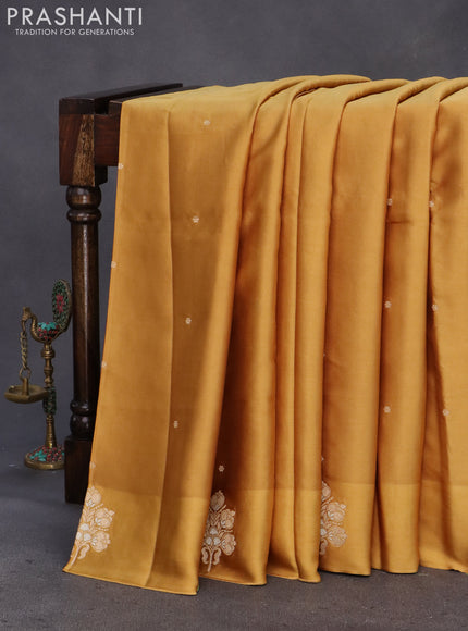 Mushru silk saree mustard shade with zari woven buttas and zari woven butta border