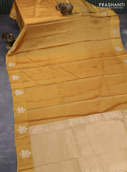 Mushru silk saree mustard shade with zari woven buttas and zari woven butta border